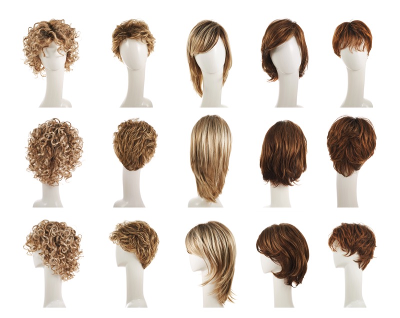 Hair wig over the white plastic mannequin head isolated over the white background, set of five different wigs in front, back and side foreshortenings